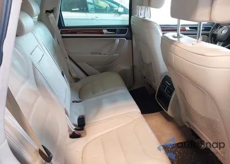 2011 Volkswagen Touareg Vr6 Lux z USA, uszkodzony, nr VIN WVGFF9BP2BD006316